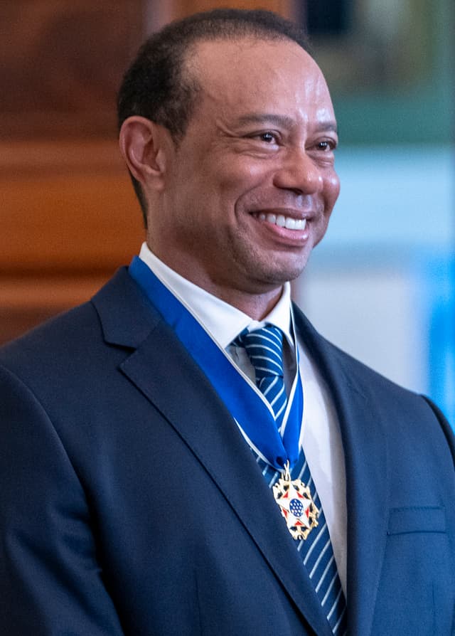 Tiger Woods - Athlete with unconfirmed hair transplant